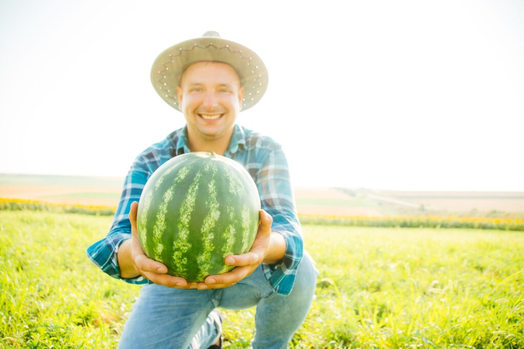 Agricultural entrepreneur with a watermelon