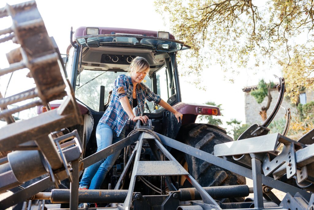 Farmer working on equipment