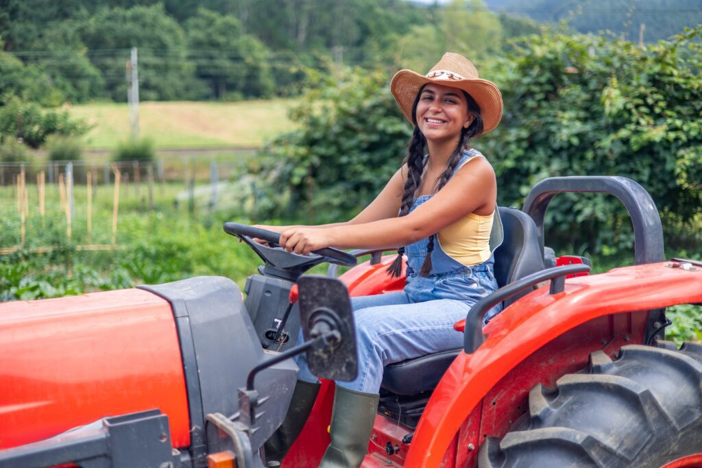 Happy farmer on a tractor
