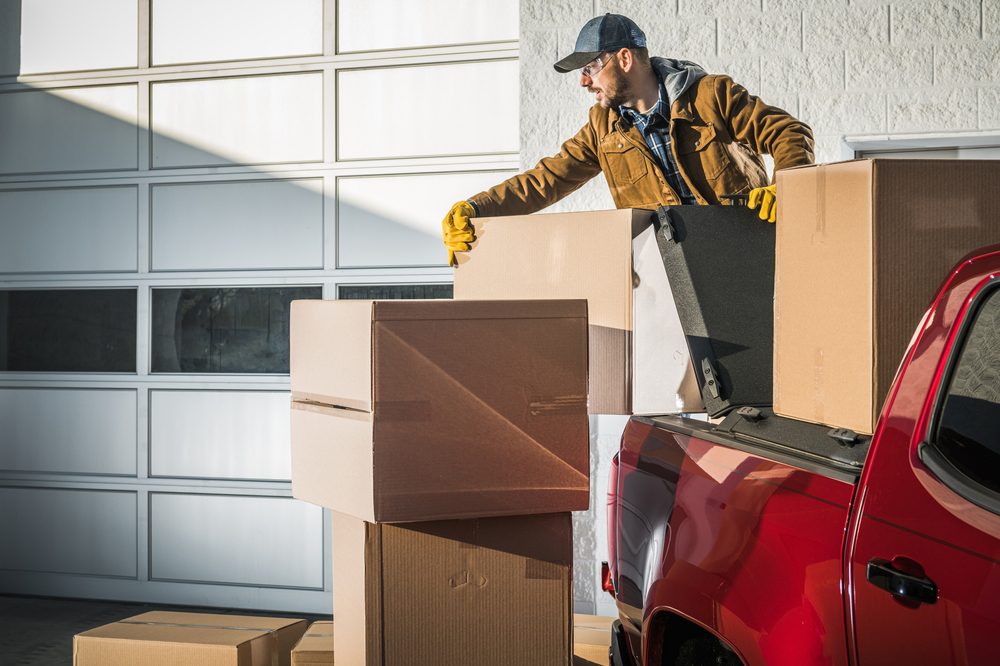 Man loading pickup truck