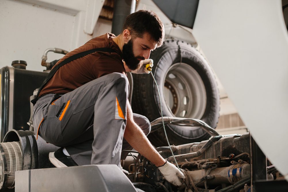 Man repairing truck